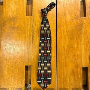 R JOSEPH PATTERNED SILK TIE IN BURGUNDY, BLUE, GREEN, GOLD AND CREAM